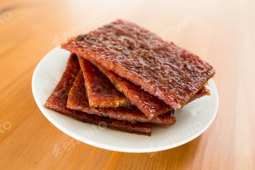 Preview: Sliced dried pork on dish