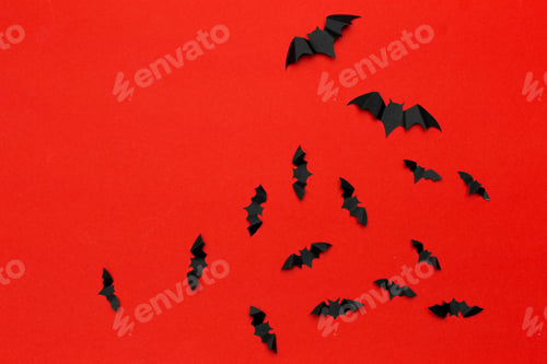 Preview: halloween and decoration concept - paper bats flying