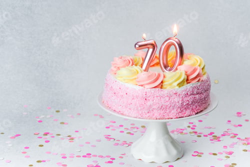 Preview: Celebrating a special 70th birthday with a colorful cake and candles