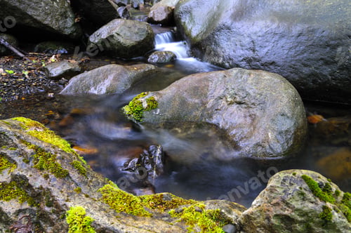 Preview: Mountain waterfall covered in fog