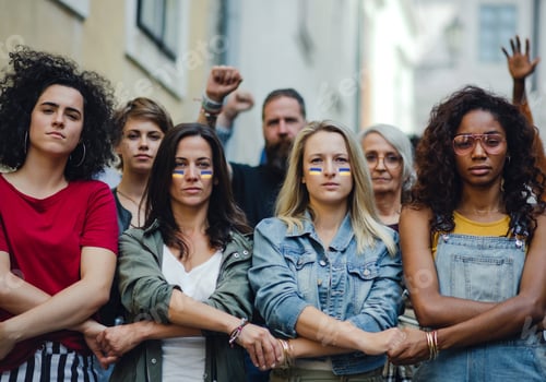 Preview: Crowd of activists protesting against Russian military invasion in Ukraine walking in street