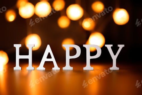 Preview: Happy - paper letters on background