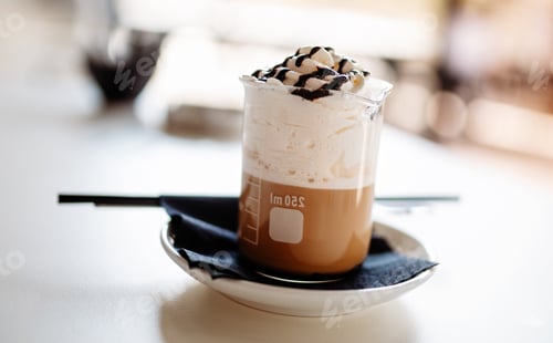 Preview: Delicious coffee with whipped cream in a glass