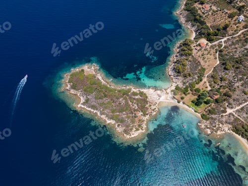 Preview: Aerial view of an island on Sithonia Peninsula, Greece, with beaches and rocks, surrounded by