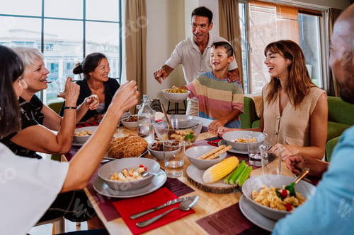 Preview: Family and friends reunion at home. Happy multigenerational family enjoying meal together at home