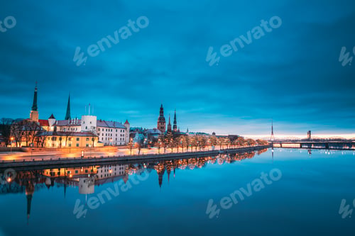 Preview: Riga, Latvia, Europe. Cityscape In Morning Time. Night View Of Castle, Dome Cathedral And St. Peter