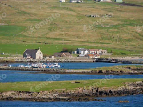 Preview: Stunning view of the Shetland Islands in Scotland, UK, blanketed in lush greenery and a tranquil sea