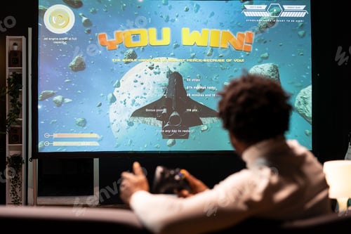 Preview: Gamer receiving victory message after completing all videogame levels, watching statistics