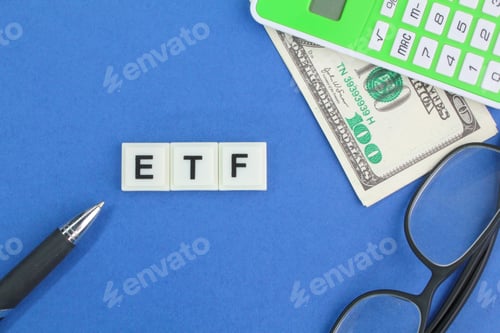 Preview: calculator, paper money, pen and glasses with letters of the alphabet ETF
