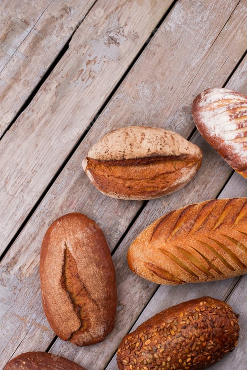 Preview: Top view of artisan bread assortment.