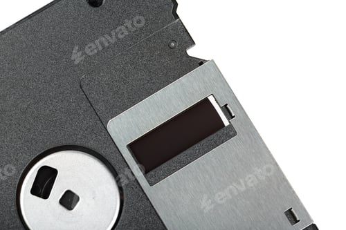 Preview: Old floppy disk showing metal and plastic design sitting on white background