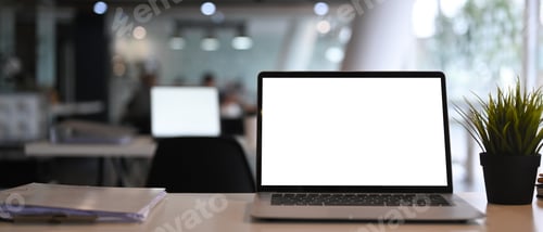 Preview: Front view of computer laptop and documents on white desk at modern office interior.