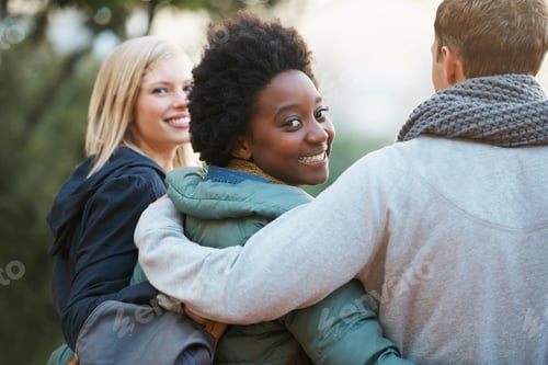 Preview: We are in every class together. Shot of a group of college friends walking arm in arm outside.