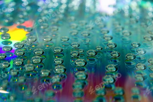 Preview: A selective focus shot of beautiful soda bubbles on a reflective disk surface