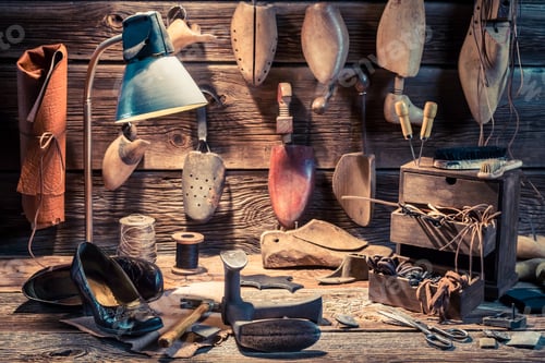 Preview: Shoemaker workplace with shoes, tools and laces