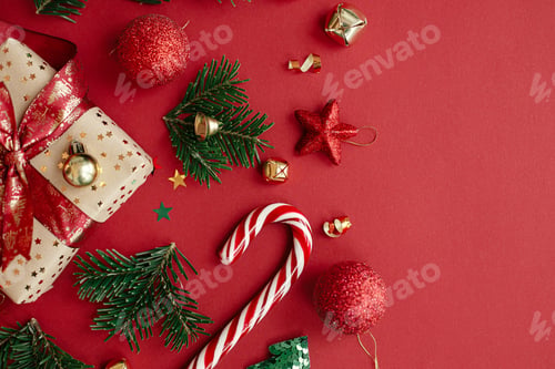 Preview: Modern christmas flat lay on red background. Merry Christmas and Happy Holidays! Festive banner