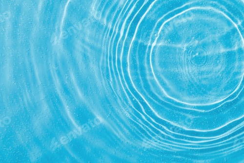 Preview: drops on water with circles on a blue background