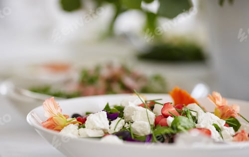 Preview: Close-up image of a festive table with different dishes.