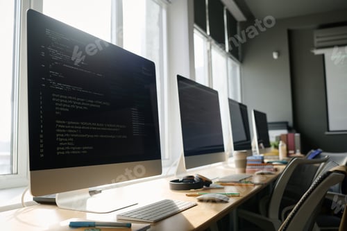 Preview: Computers With Codes On Screens In Classroom