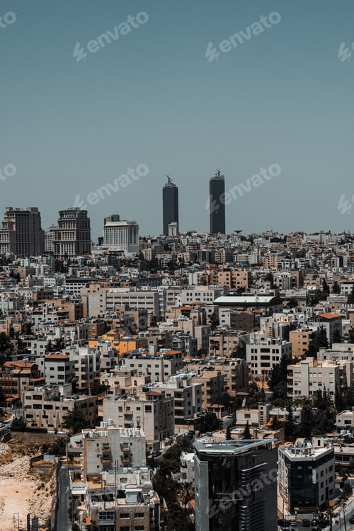 Preview: Vertical aerial view of the buildings of Amman during a cloudy day in Jordan