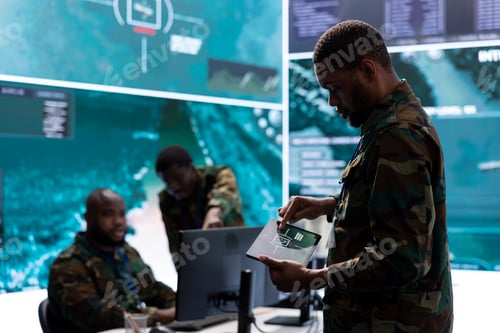 Preview: Group of soldiers in a secure office environment collaborates on intelligence analysis