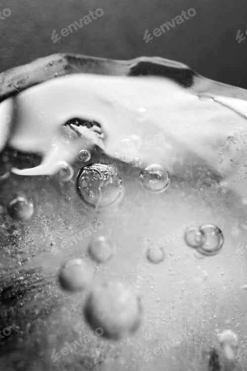Preview: Macro ice texture, vertical. Frozen water with air bubbles close-up