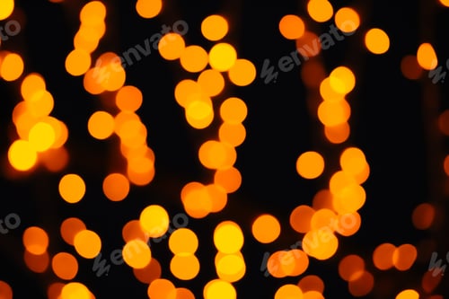 Preview: Blurred christmas background and bokeh defocus yellow light. Color fortuna gold.