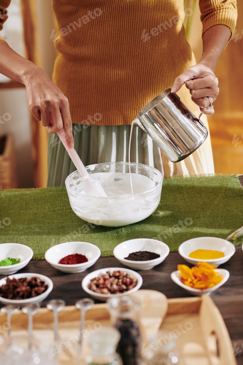 Preview: Woman mixing liquid soap ingredient