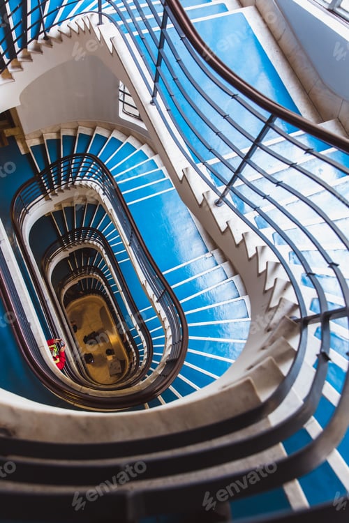 Preview: Old blue spiral staircase, spiral stairway inside an old house in Budapest, Hungary. Project