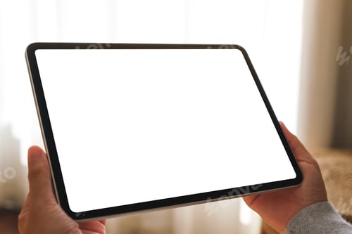 Preview: Mockup image of a woman holding digital tablet with blank desktop screen at home