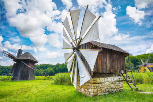 Preview: Amazing summer view of traditional romanian windmill.