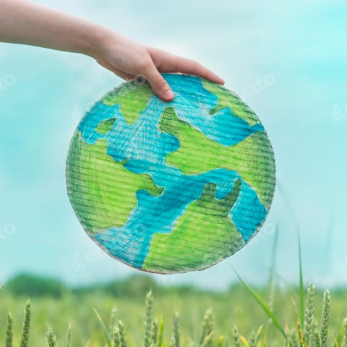 Preview: girl holding drawn planet in hands