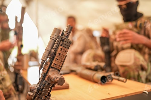 Preview: US Army Rangers group with weapons. army , planning strategy or teamwork
