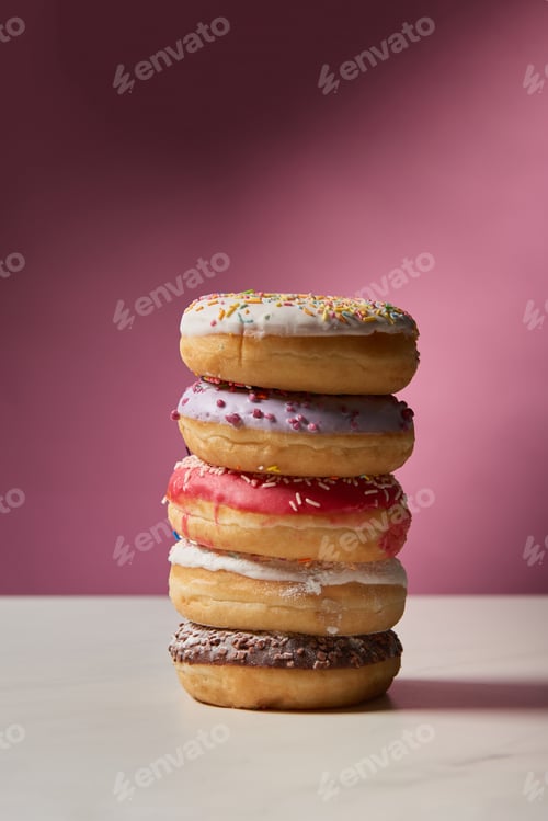 Preview: sweet glazed doughnuts on pink background
