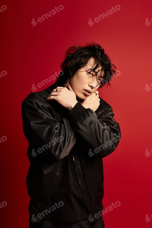 Preview: Stunning asian man in a jacket strikes a pose, exuding quiet confidence