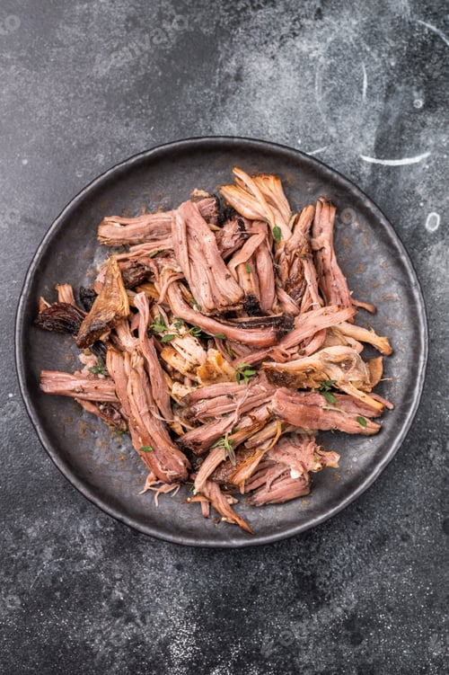 Preview: A tantalizing plate of pulled brisket, slow-cooked to perfection