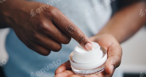 Preview: Hands, skincare and person with cream for moisturizer, hydration and beauty. Sunscreen, spf cosmeti