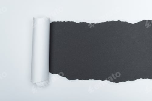 Preview: A piece of white paper is torn to reveal a dark gray background