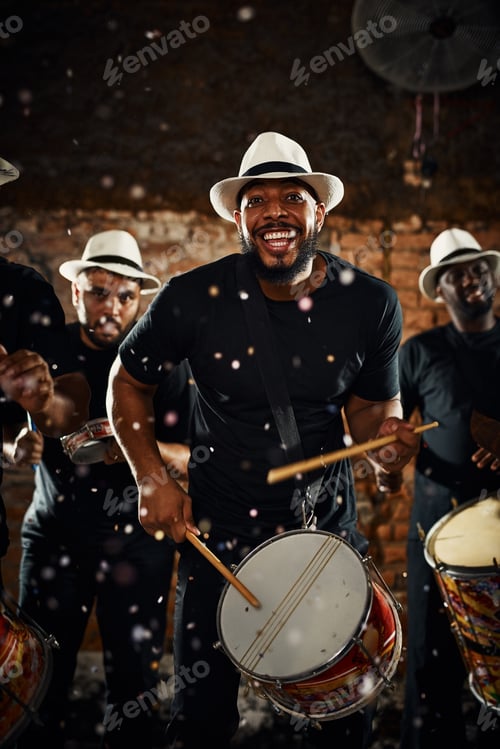 Preview: Portrait of a group of musical performers playing drums together