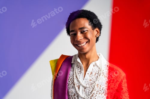 Preview: Fashionable fluid gender man posing in studio