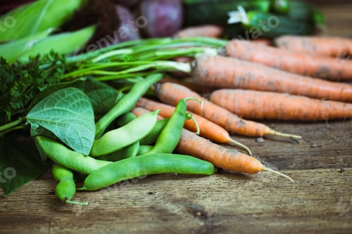 Preview: Fresh vegetables beet carrot cucumber onion pepper potato tomato. Vegetarian food. Healthy life.