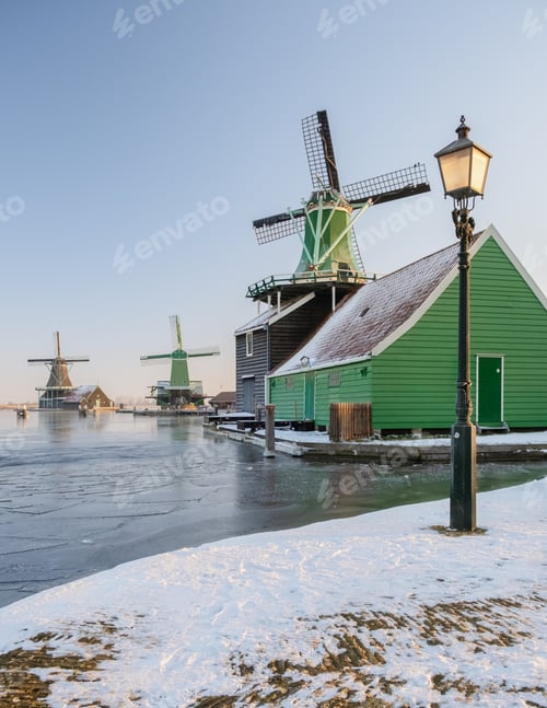 Preview: Zaanse Schans Netherlands a Dutch windmill village during sunset whit wooden house holland