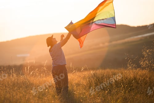 Preview: Young woman with LGBT flag.