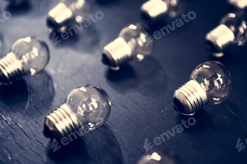 Preview: Lightbulbs on black textured table