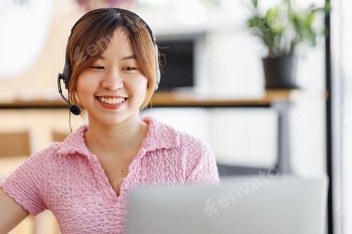 Preview: Young adult happy smiling Hispanic Asian student wearing headphones talking on online chat meeting u