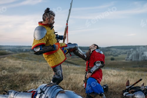 Preview: Medieval knight in armor prepares to cut off head