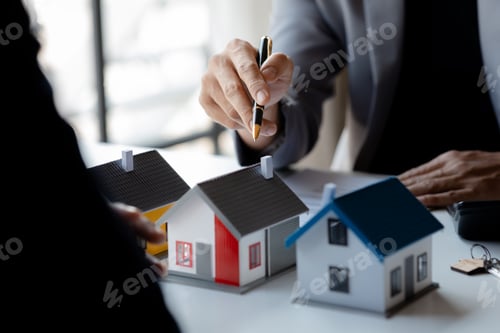 Preview: Real estate agents explain models of housing estates in projects.