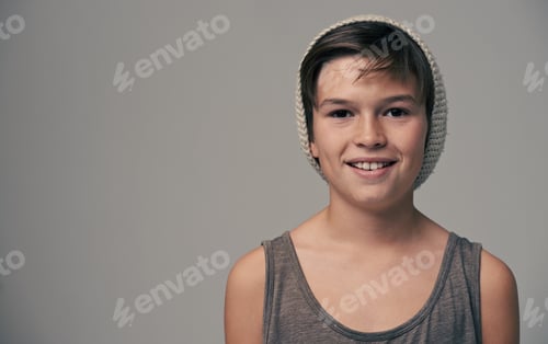 Preview: Young and hip. Studio portrait of a stylishly dressed young boy wearing a woolen hat.