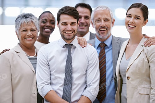 Preview: We the best in the business. Cropped portrait of a group of businesspeople standing in the office.