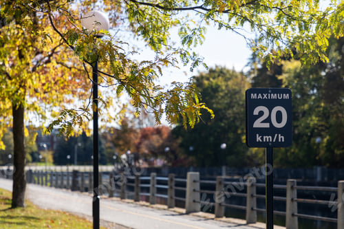 Preview: Maximum 20 km h speed limit sign on Rideau canal pathway in Ottawa